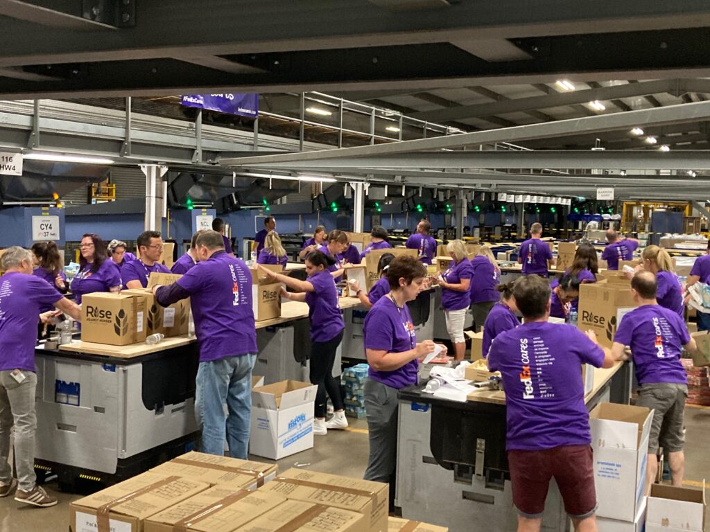 FedEx volunteers pack 2,400 food boxes to support Ukrainian refugees