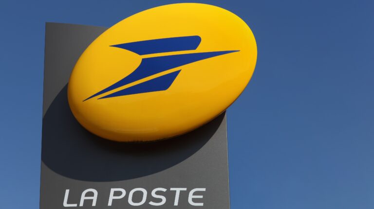 La Poste Groupe company logo outside a building.