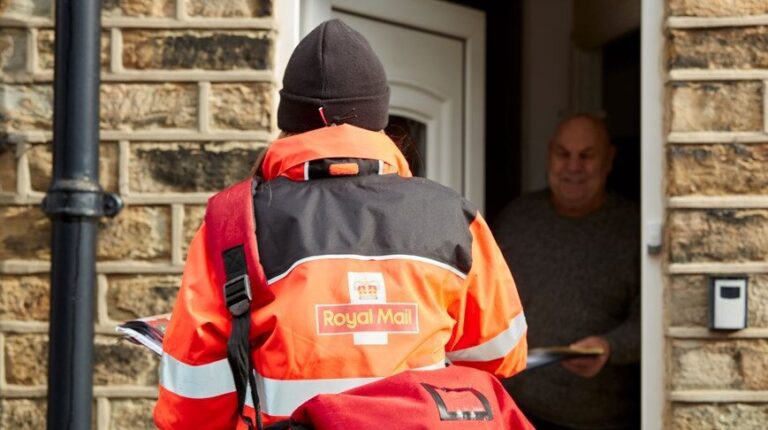 Royal Mail announces Collective Defined Contribution pension plan for 100,000 staff Royal Mail postal worker delivering mail to home.