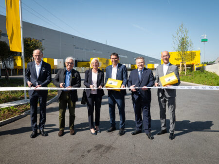 Austrian Post opens €70m logistics center in Vienna-Inzersdorf Austrian Post officials cutting the ribbon at the opening of the new parcel logistics center in Vienna-Inzersdorf