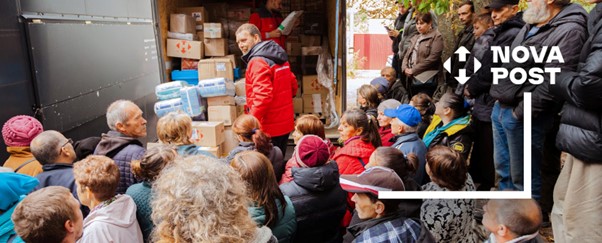 Nova Post workers handing out aid