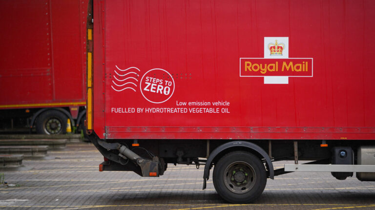 Royal Mail saves 30,000 metric tons of CO2e with HVO rollout Red Royal Mail heavy goods vehicle which is powered by hydrotreated vegetable oil.