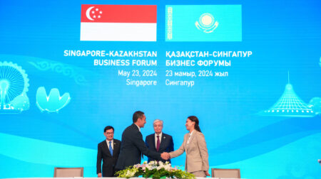 SingPost and QazPost partner to advance e-commerce and logistics L-R: Vincent Phang, Group CEO, Singpost, signs partnership agreement with Asel Zhanassova, Chairman of the Board of JSC QazPost. Witnessed by Deputy Prime Minister and Coordinating Minister for Economic Policies, Singapore, Heng Swee Keat and the President of the Republic of Kazakhstan, Kassym-Jomart Tokayev. Photo credit: Singpost.