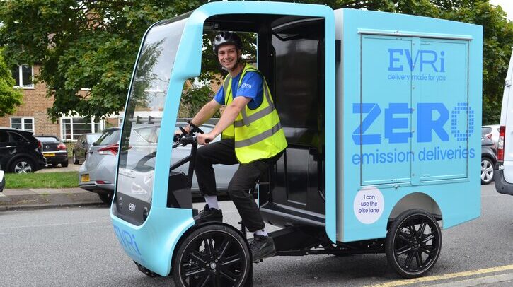 Evri invests £19m to roll out e-cargo bikes across UK Evri delivery working riding a blue Evri e-cargo bike