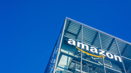 Amazon to invest €10bn in logistics and R&D across Germany Amazon logo at office building, Munich Germany
