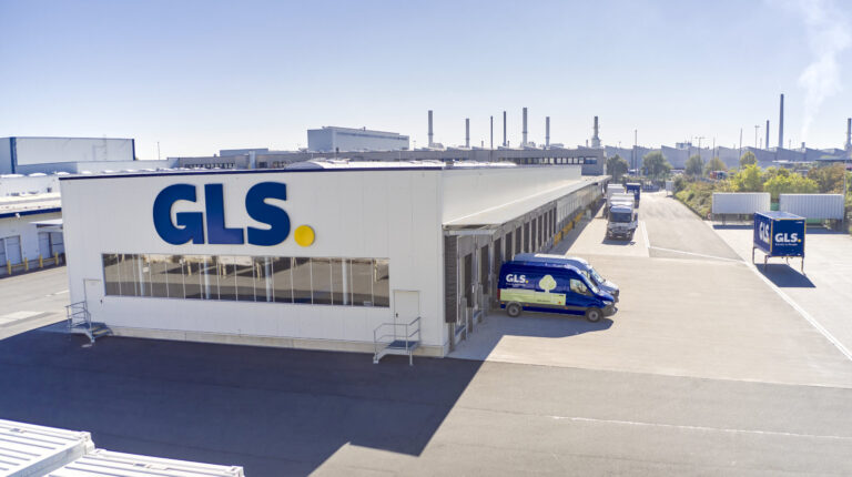 GLS depot with vans on the forecourt.