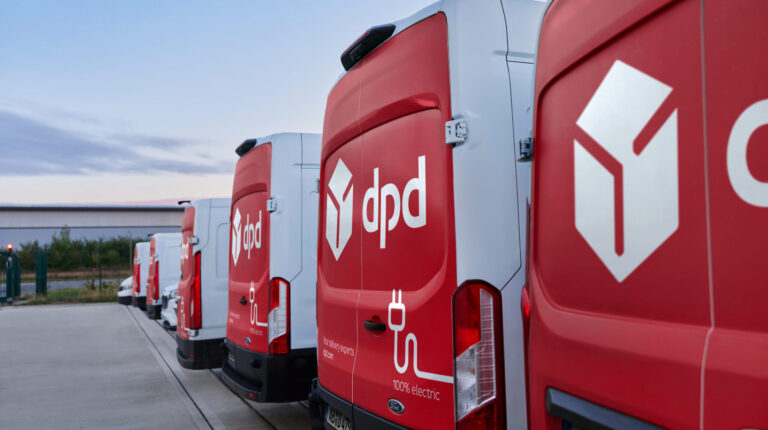 Geopost achieves 1.3% revenue growth, delivers one billion parcels in H1 2024 Row of red and white DPD vans.