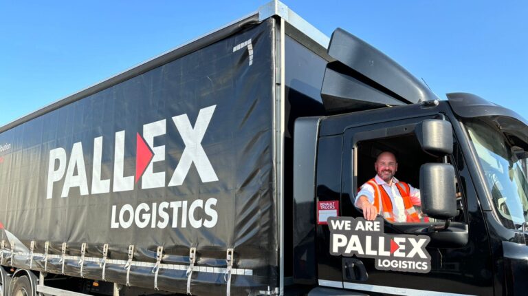 Pallex Logistics truck with white and red logo on black background