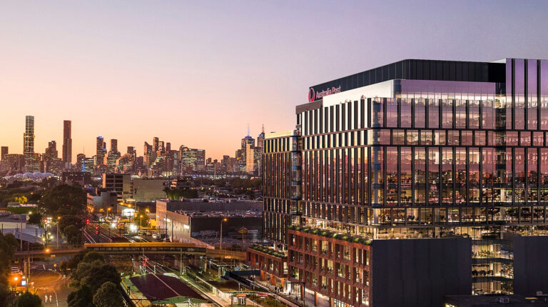 Australia Post streamlines tech investment process Australia Post building at dusk
