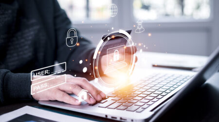 The businessman holds a credit card under the concept of how to safely make credit card payments to avoid fraud and deception.