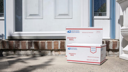 ANALYSIS: Tariffs and turmoil – discussing the latest US last-mile developments Priority Mail and Express mail packages on residential doorsteps. Shot for Website and 475