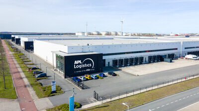 APL Logistics opens distribution and fulfillment center at the Port of Amsterdam Aerial view of the APL Logistics semi-automated distribution and fulfilment warehouse in the Port of Amsterdam. It has white walls and roof and black doors along the side.
