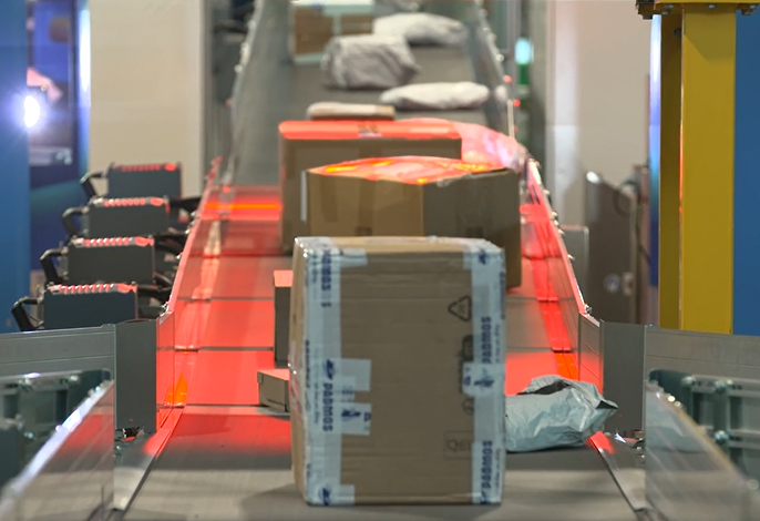 Parcels on sorting belt at An Post's Athlone Mail Center
