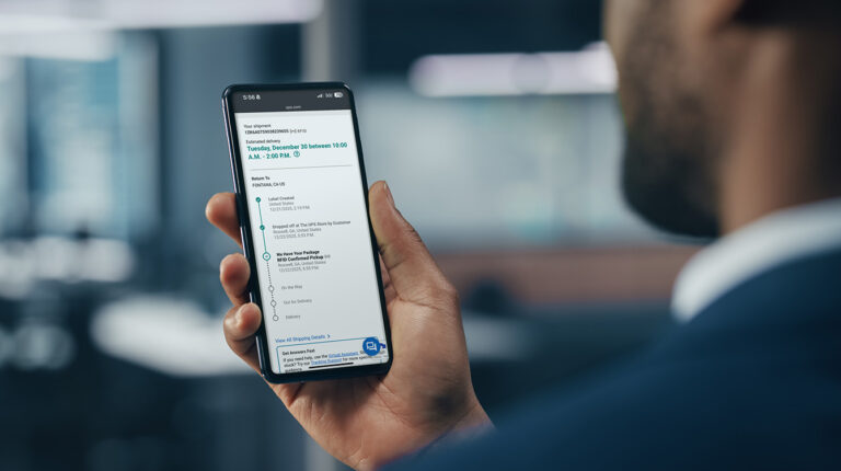 UPS rolls out RFID sensing technology across US operations A customer in a dark blue suit looks at the UPS app on their smartphone.