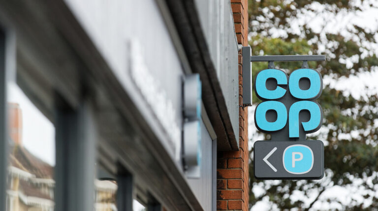 Store front of a Co-op store on the high street.