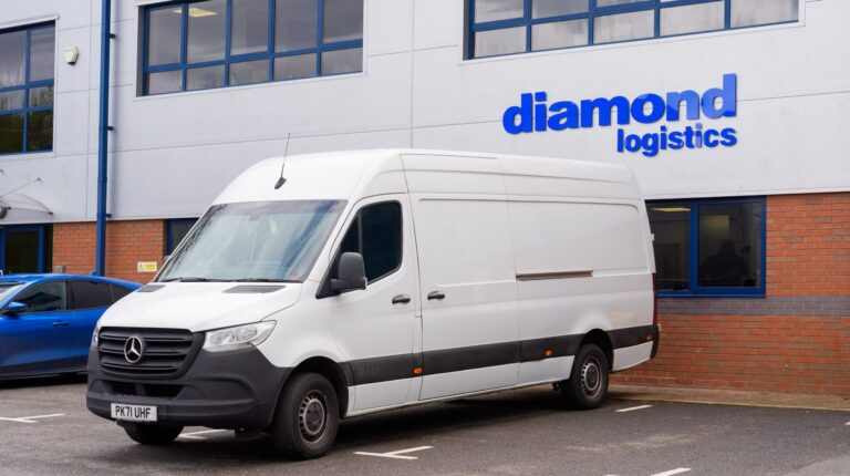 Diamond Logistics expands network with new Cambridge partner A white delivery van parked in front of a Diamond Logistics branded warehouse.