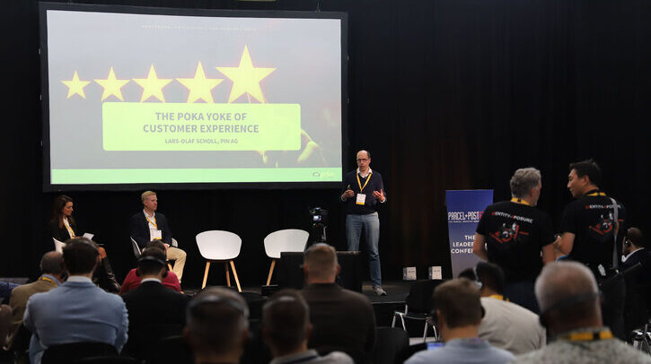 Parcel+Post Expo announces unmissable conference sessions and early-bird discounts Speaker on stage at Parcel+Post Expo 2025