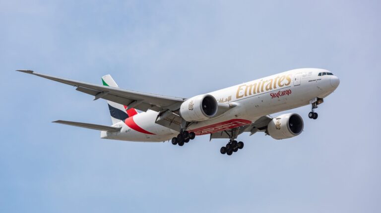 Dubai Customs and Emirates SkyCargo develop logistics bridge to accelerate customs clearance across Gulf region An Emirates airplane in flight, with its landing gear down.