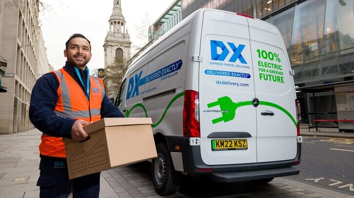DX launches hyperlocal delivery service Delivery driver with parcel in front of DX delivery van