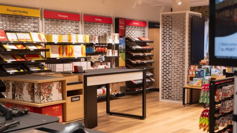 Australia Post plans restoration and parcel lockers for heritage Yass Post Office Interior of an Australia Post post office, with a range of shelves, products and service offerings.